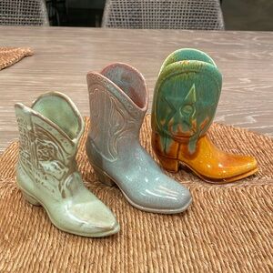3 ceramic decorative cowboy boots 
One is Metlox. One looks like Frankoma